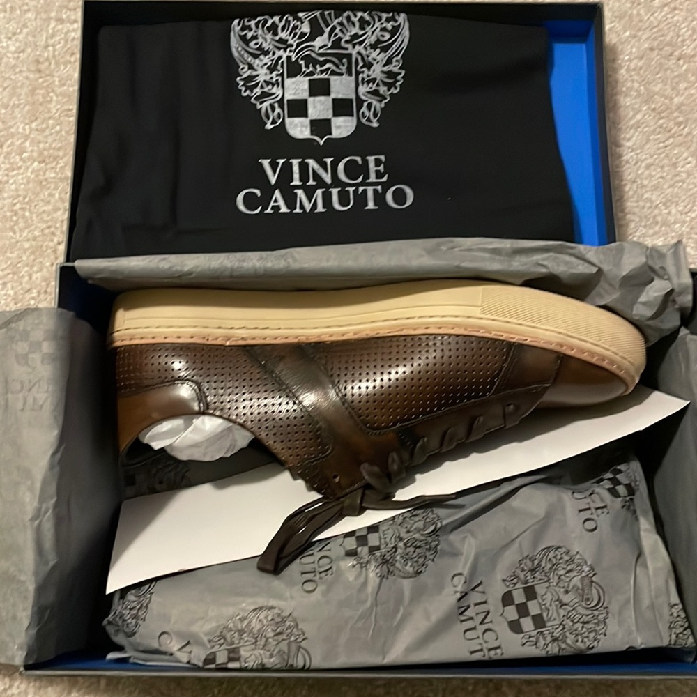 Brand new Vince Camuto sneakers. Genuine perforated leather